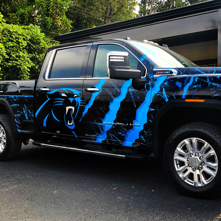 GMC Pickup truck with a Carolina Panthers graphic wrap