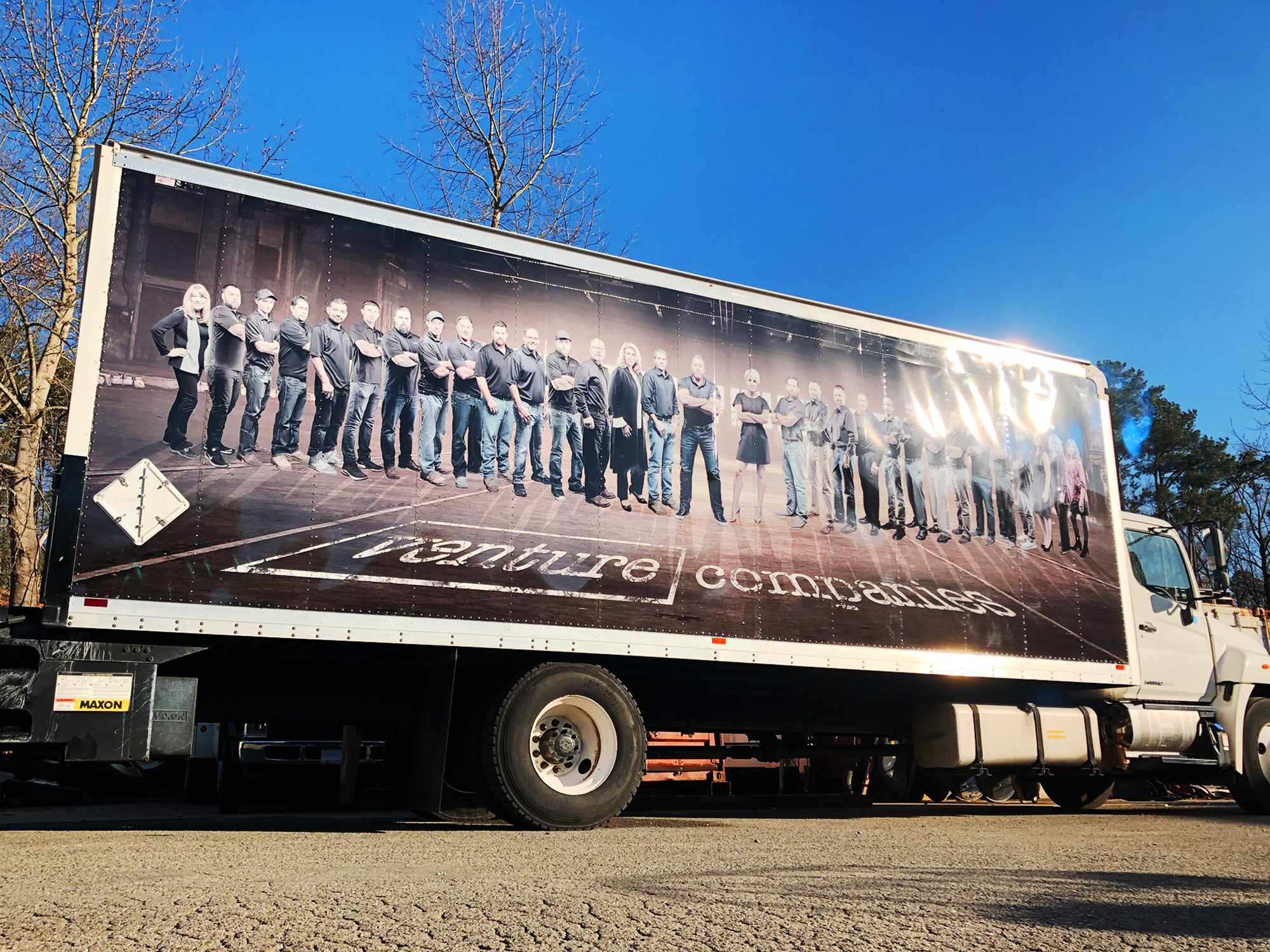 Large format photos on a trailer.