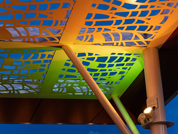 Canopy metalwork illuminated by colorful LED lights