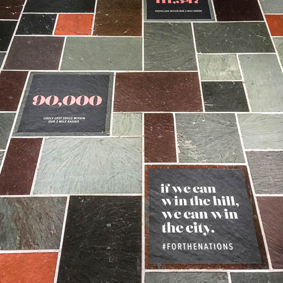Environmental branding reminds members of the church's mission field.