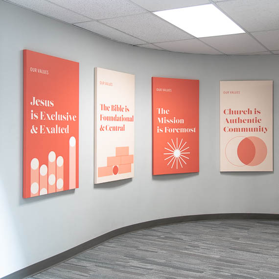 First Baptist Charlotte's mission statement present in four canvas wrapped panels.