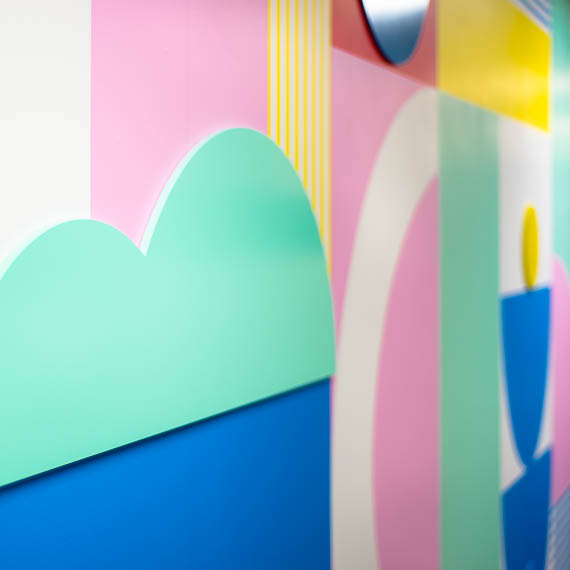 Cloud and other shapes in bright pastel colors.