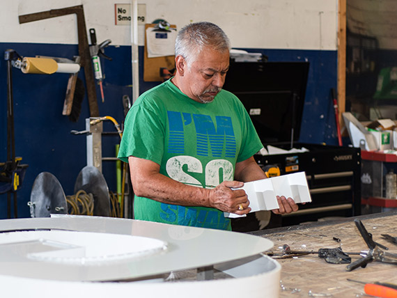 Fabrication worker building channel letters