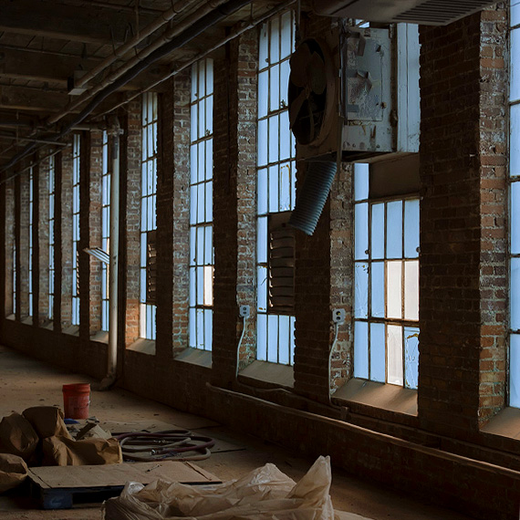 Blue glass windows in Historic Cannon Mill #14 located in Concord, NC.
