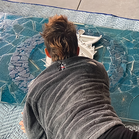 Katlyn, Tuxedo Kat Imaginarium putting the finishing touches on the center section.